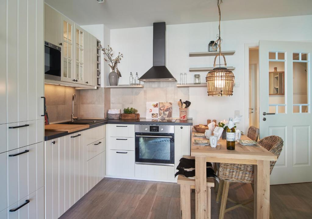 Kuchyň nebo kuchyňský kout v ubytování Sweet Home