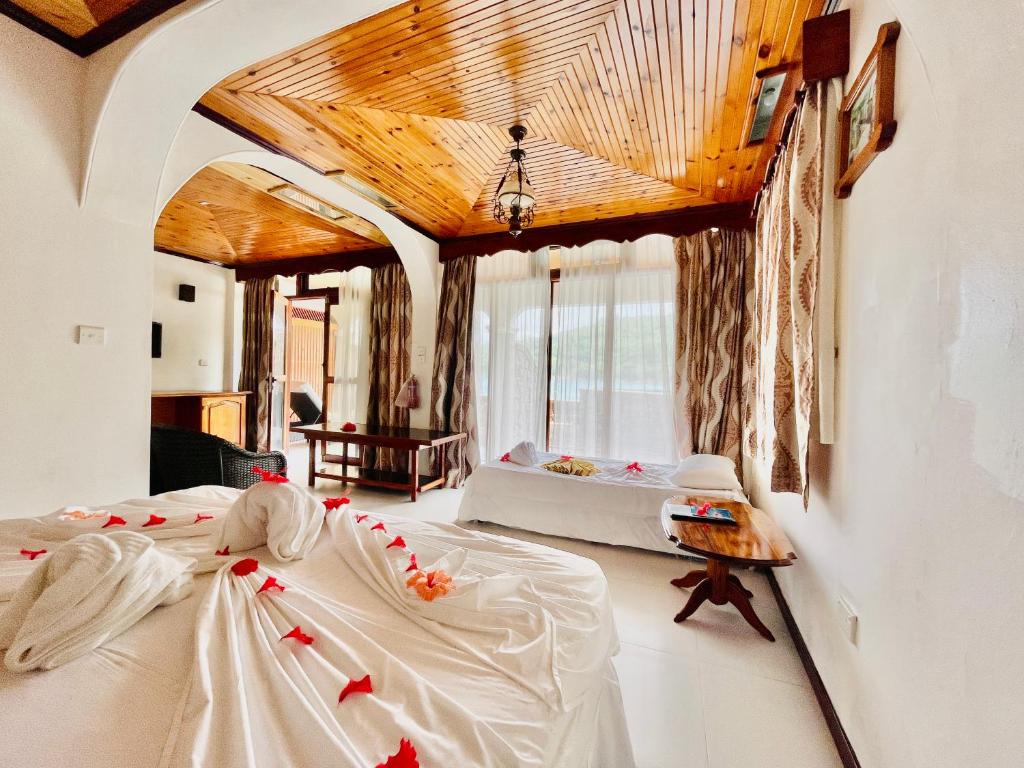 Postel nebo postele na pokoji v ubytování Villa Chez Batista