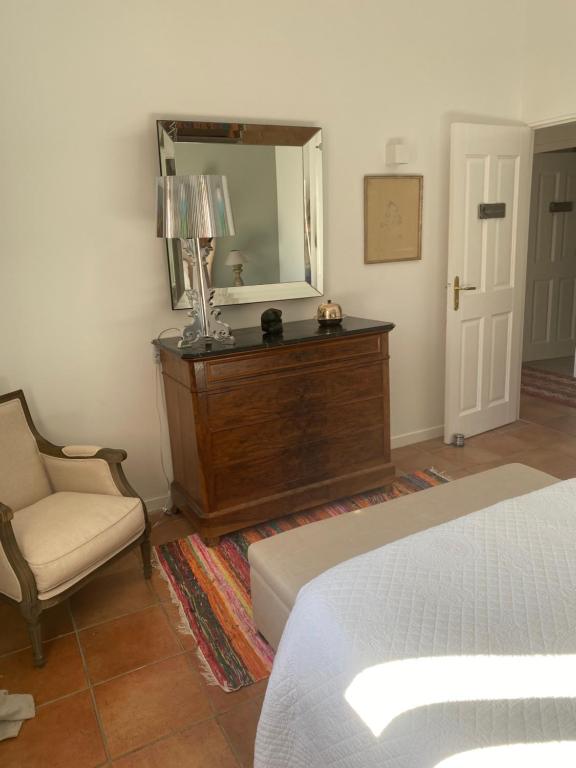 Postel nebo postele na pokoji v ubytování Villa des Roses