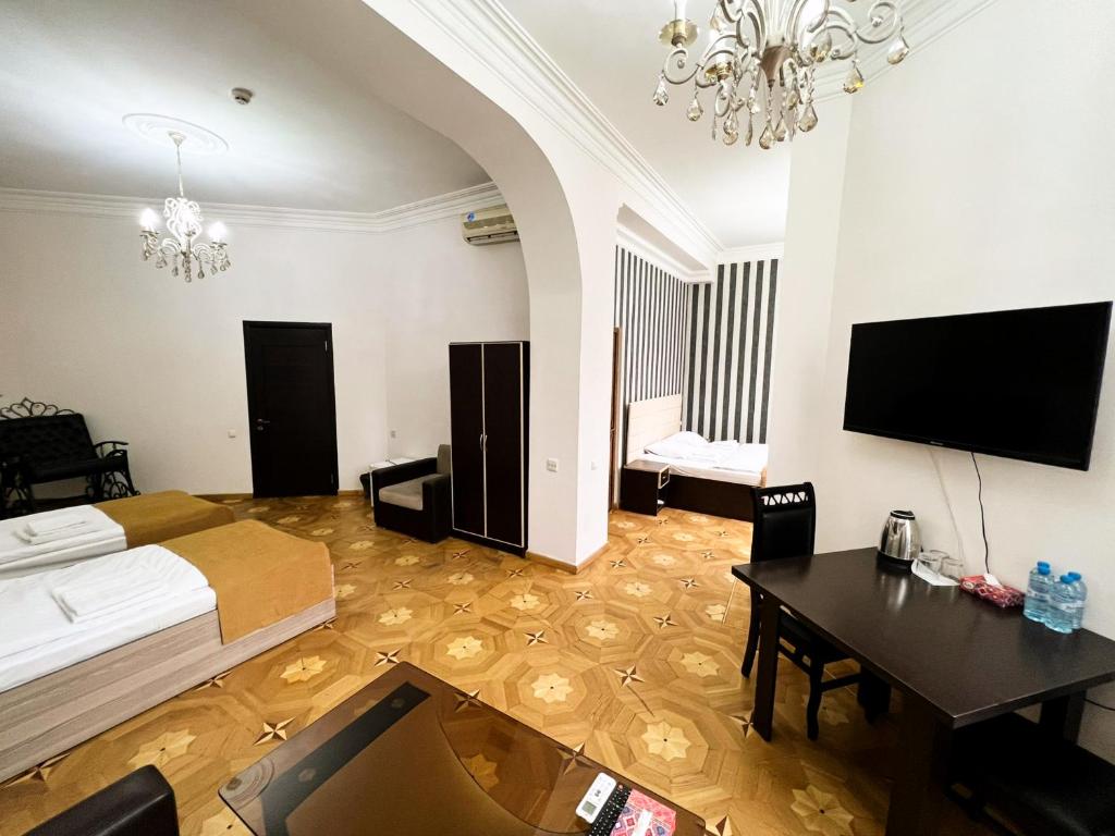 TV a/nebo společenská místnost v ubytování Olive hotel