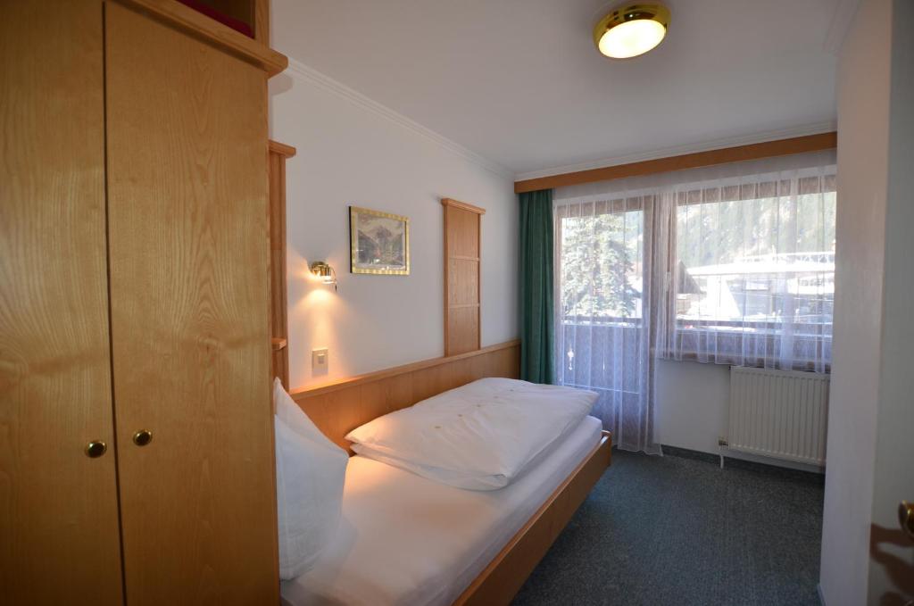 Postel nebo postele na pokoji v ubytování Haus Monika und Haus Claudia