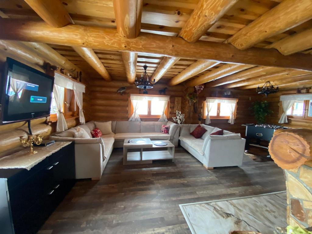 A television and/or entertainment centre at Zrubová Chata Sylvester