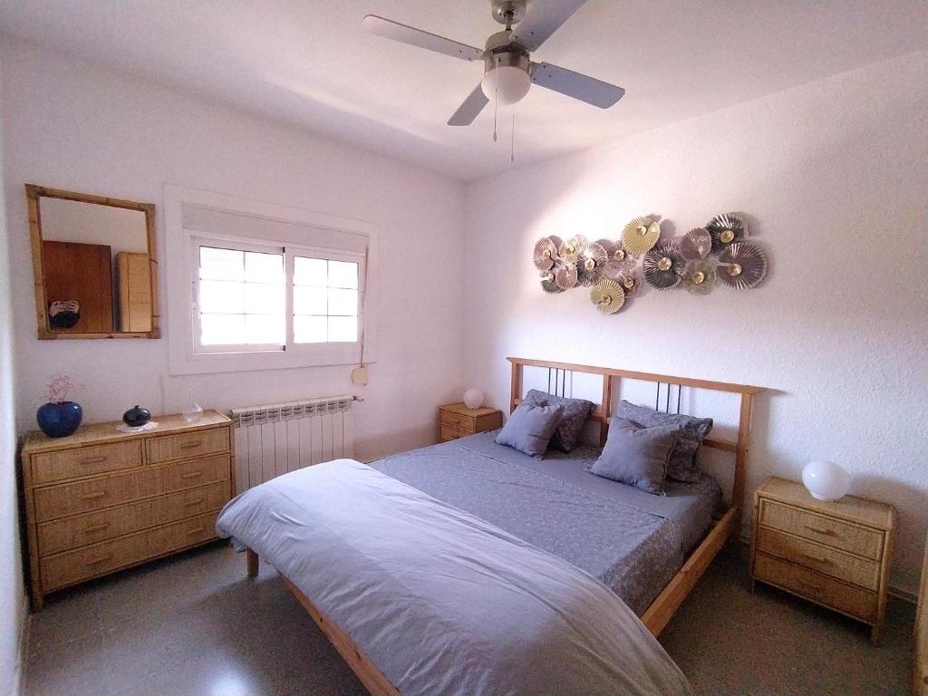 Postel nebo postele na pokoji v ubytování Apartamento Can Jaramills 1