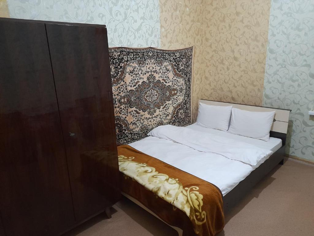 Postel nebo postele na pokoji v ubytování ВВ-ХОСТЕЛ