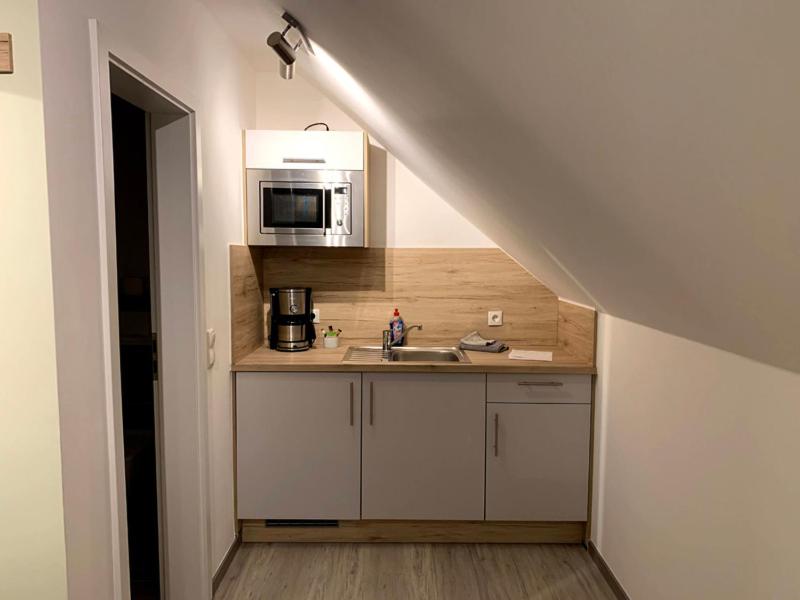 Kuchyň nebo kuchyňský kout v ubytování Hotel Schmidt's Hoern
