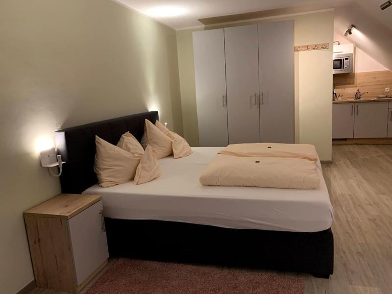 Postel nebo postele na pokoji v ubytování Hotel Schmidt's Hoern