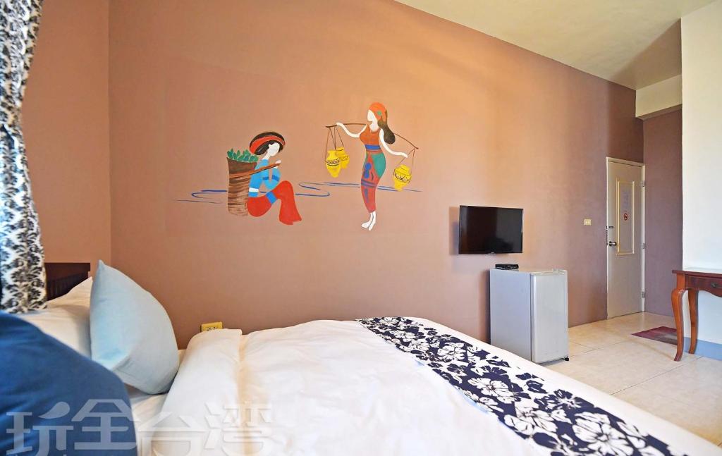 TV a/nebo společenská místnost v ubytování 沿海地帶 海景民宿 coastland B&B