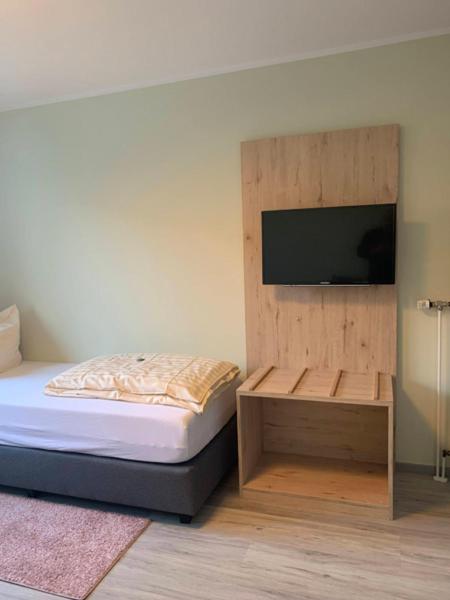 Postel nebo postele na pokoji v ubytování Hotel Schmidt's Hoern