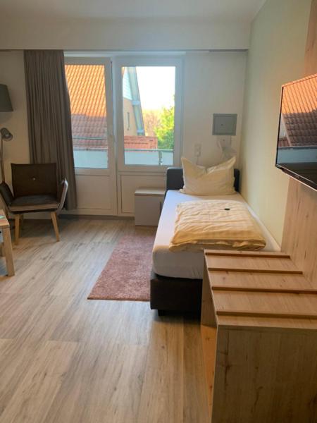 Postel nebo postele na pokoji v ubytování Hotel Schmidt's Hoern