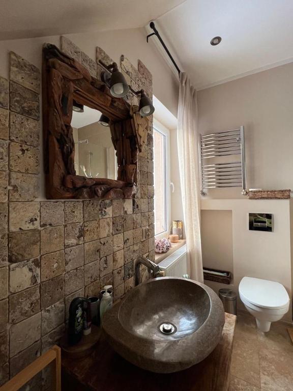 Kúpeľňa v ubytovaní Liwa Garden Krzywa 11