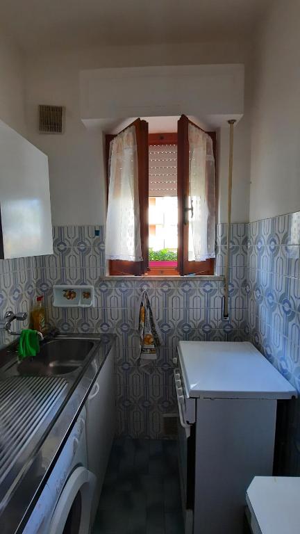 Kuchyň nebo kuchyňský kout v ubytování A casa di Laura