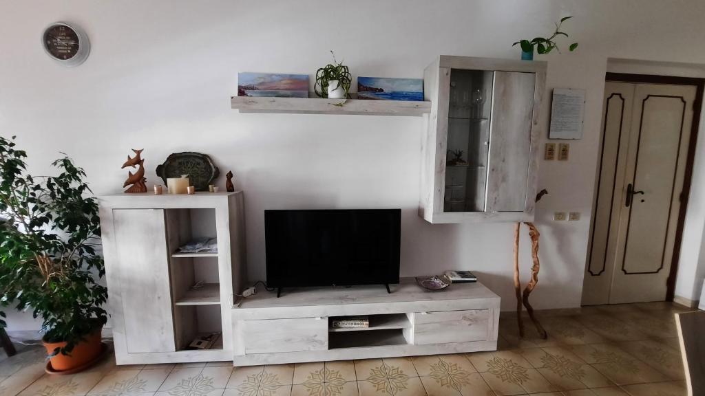 TV a/nebo společenská místnost v ubytování A casa di Laura