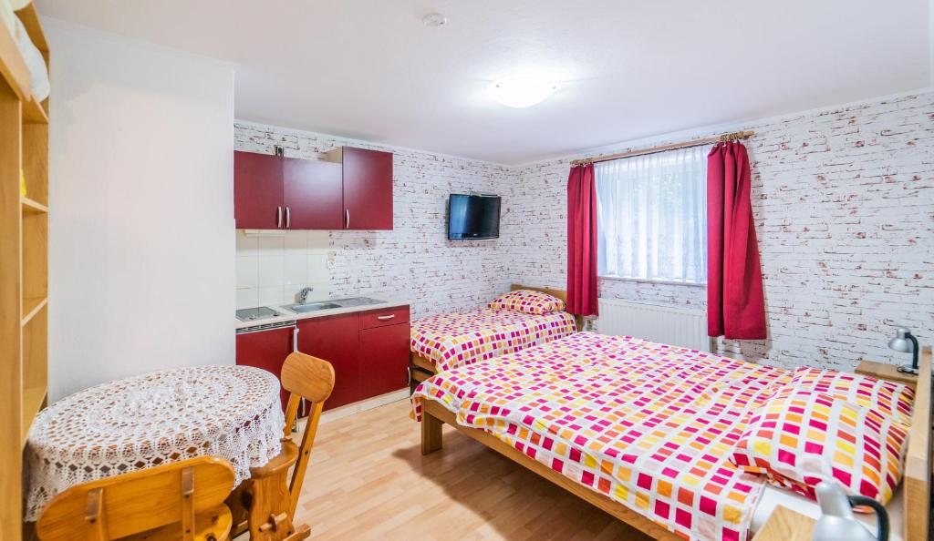 Postel nebo postele na pokoji v ubytování Panorama B&B