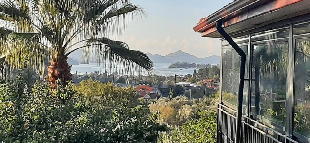 a view of the ocean from a house with a window at Villa Göcek in Göcek