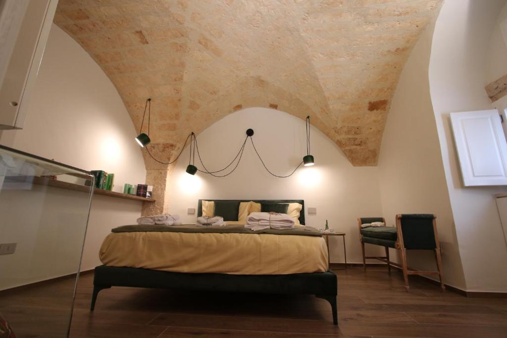 Łóżko lub łóżka w pokoju w obiekcie MATTEI LUXURY B&B