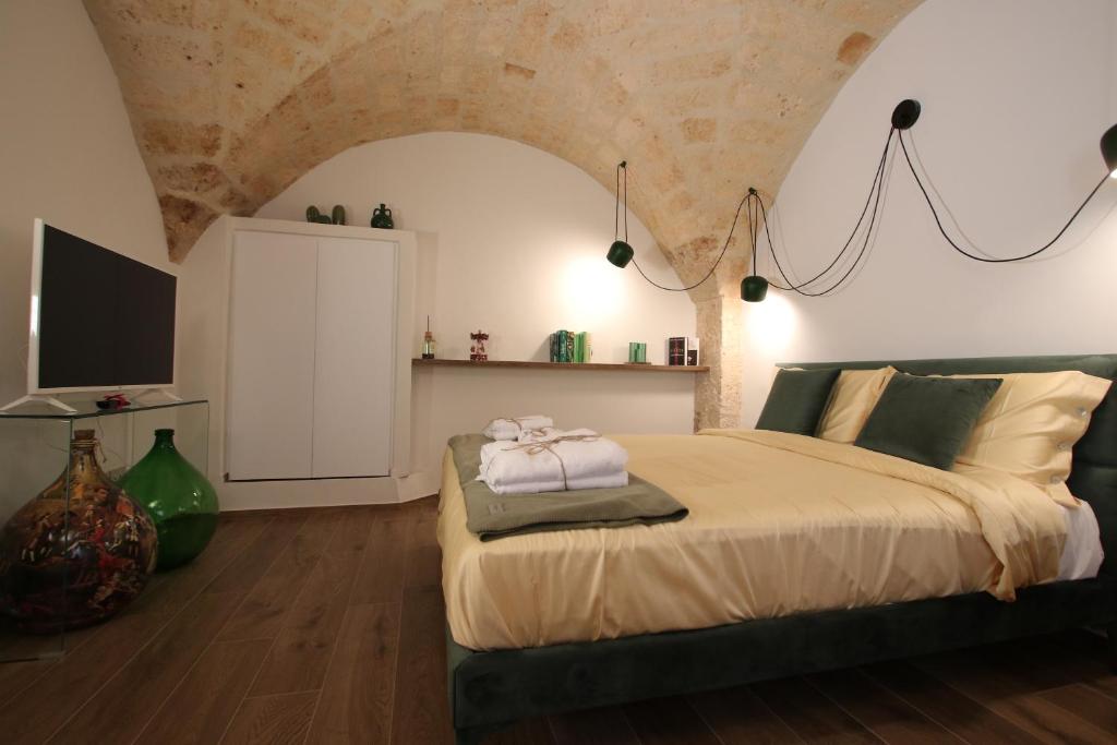 Łóżko lub łóżka w pokoju w obiekcie MATTEI LUXURY B&B