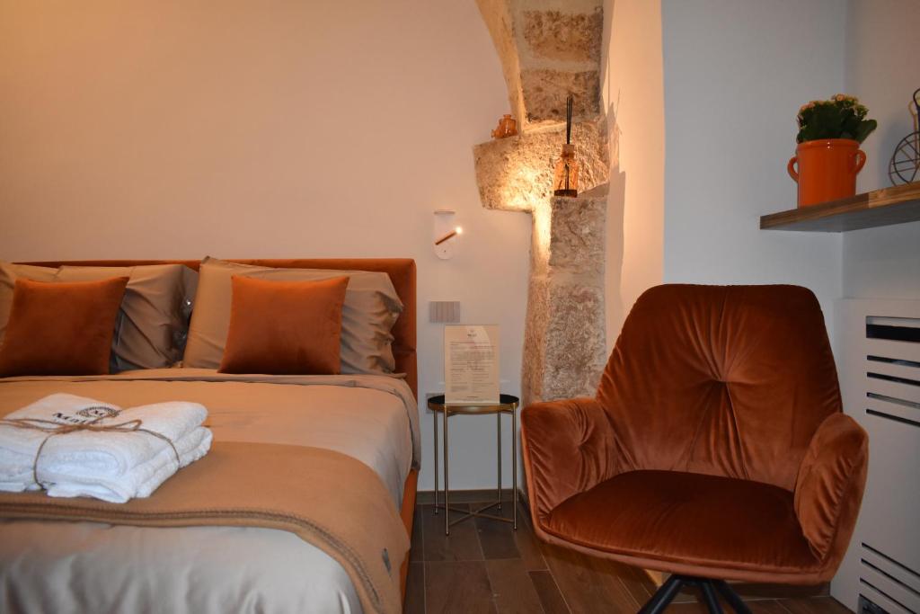Łóżko lub łóżka w pokoju w obiekcie MATTEI LUXURY B&B
