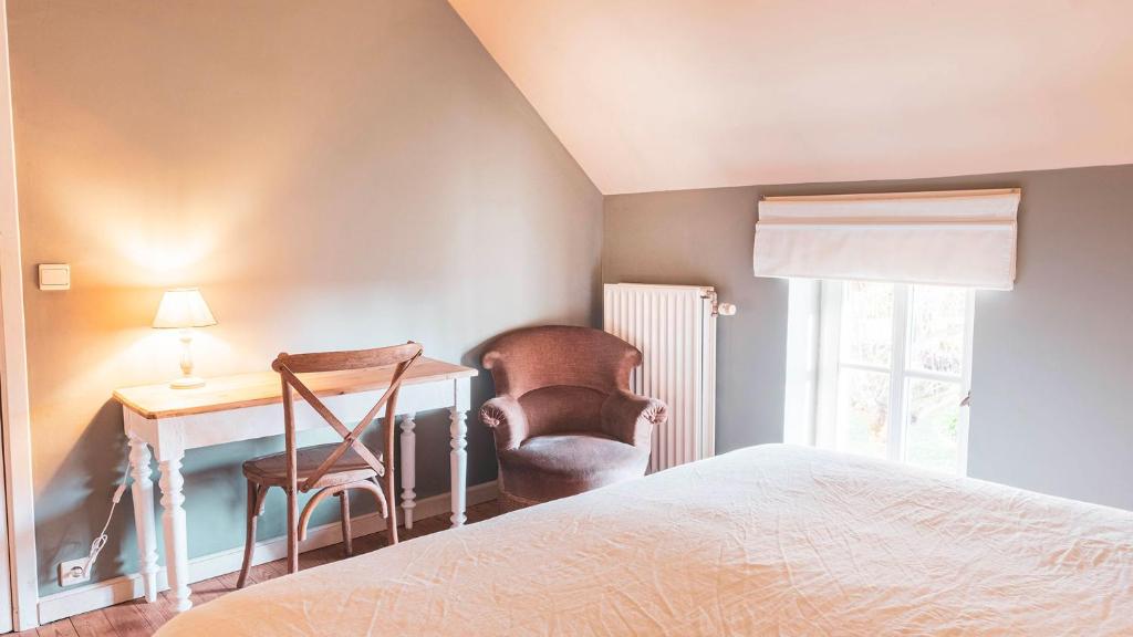 Postel nebo postele na pokoji v ubytování Le Gîte - Graty