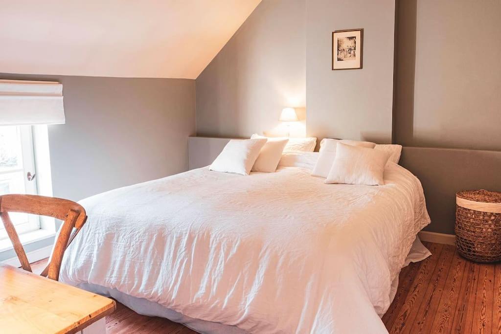 Postel nebo postele na pokoji v ubytování Le Gîte - Graty