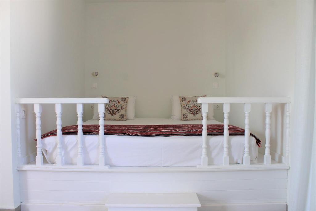Postel nebo postele na pokoji v ubytování Stegna Akti Luxury Suites