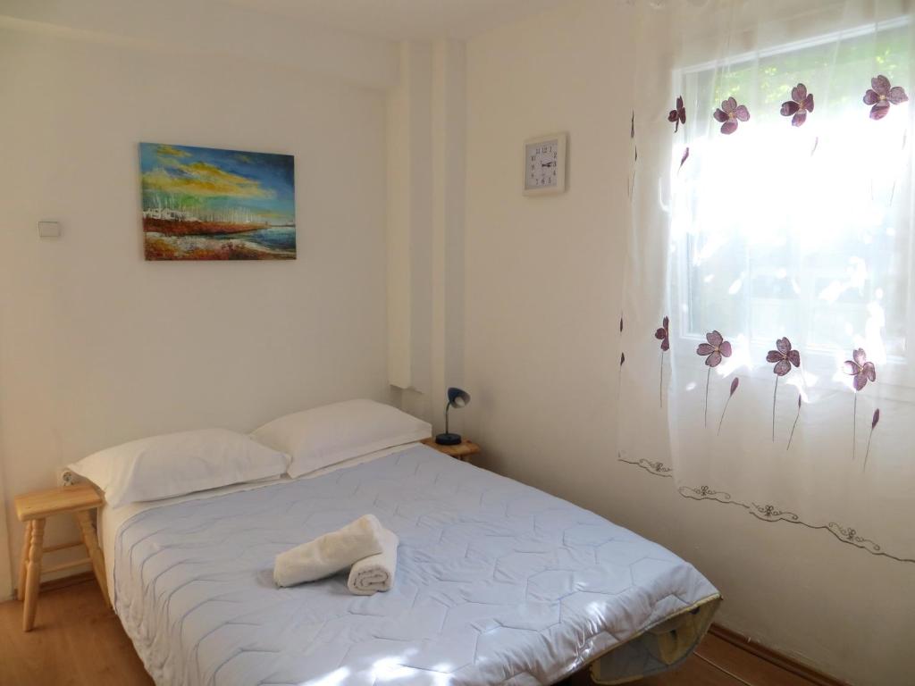 Postel nebo postele na pokoji v ubytování Apartments Odrina