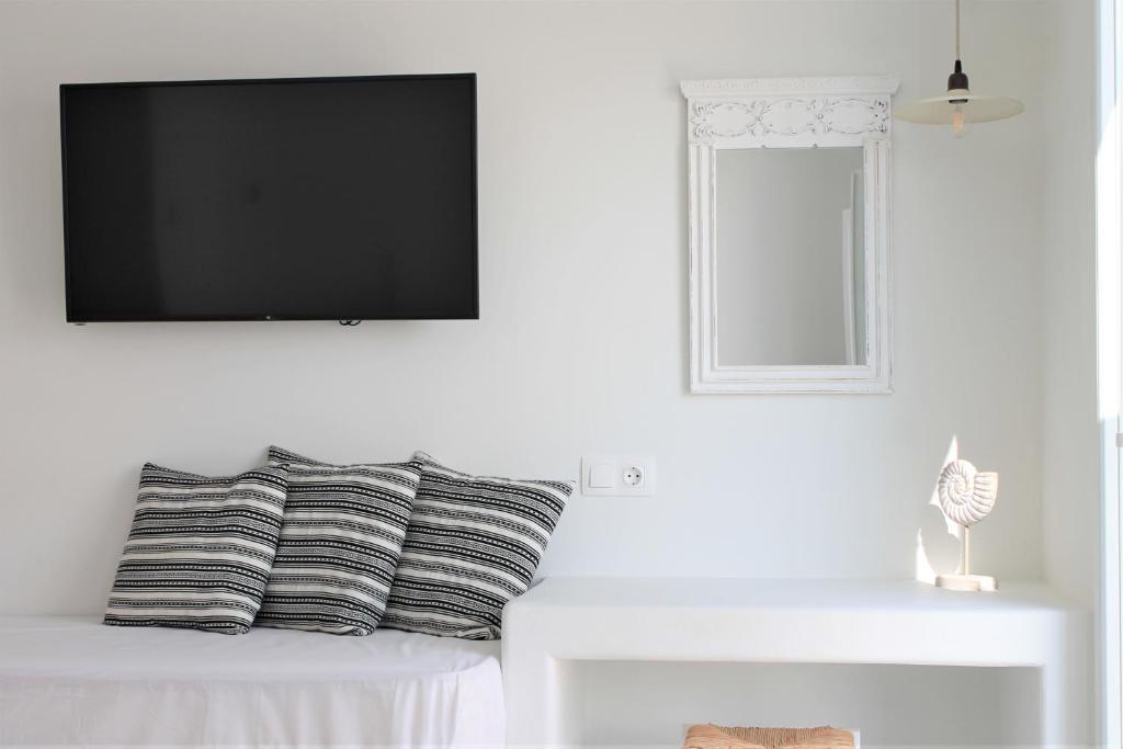 Postel nebo postele na pokoji v ubytování Stegna Akti Luxury Suites