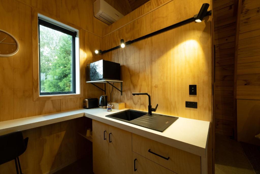 Kuchyň nebo kuchyňský kout v ubytování Benger Garden Chalets