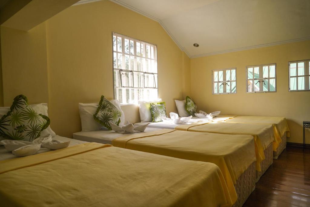 Postel nebo postele na pokoji v ubytování Charming Tagaytay Vacation Home