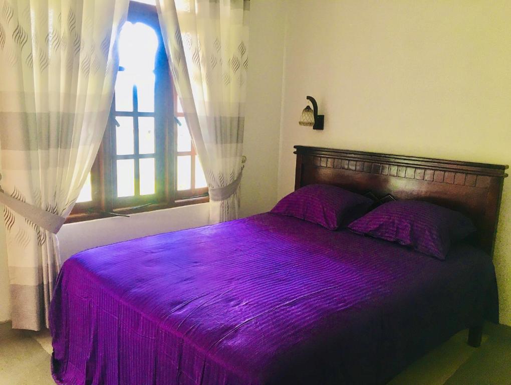 Postel nebo postele na pokoji v ubytování Bella Ella
