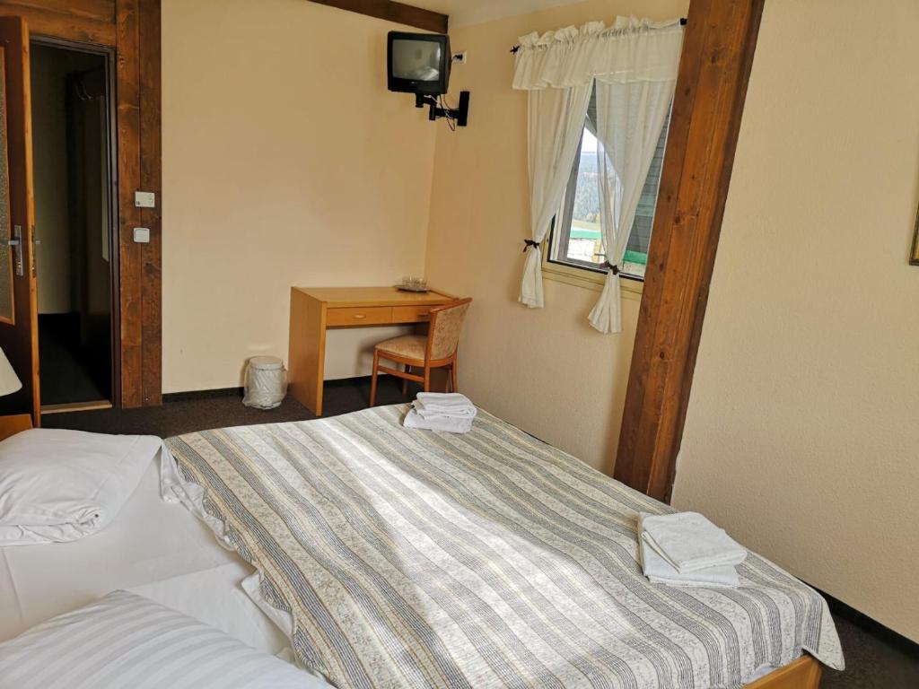 Postel nebo postele na pokoji v ubytování Hotel PAM