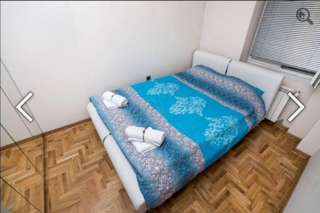 Postel nebo postele na pokoji v ubytování Višegradska