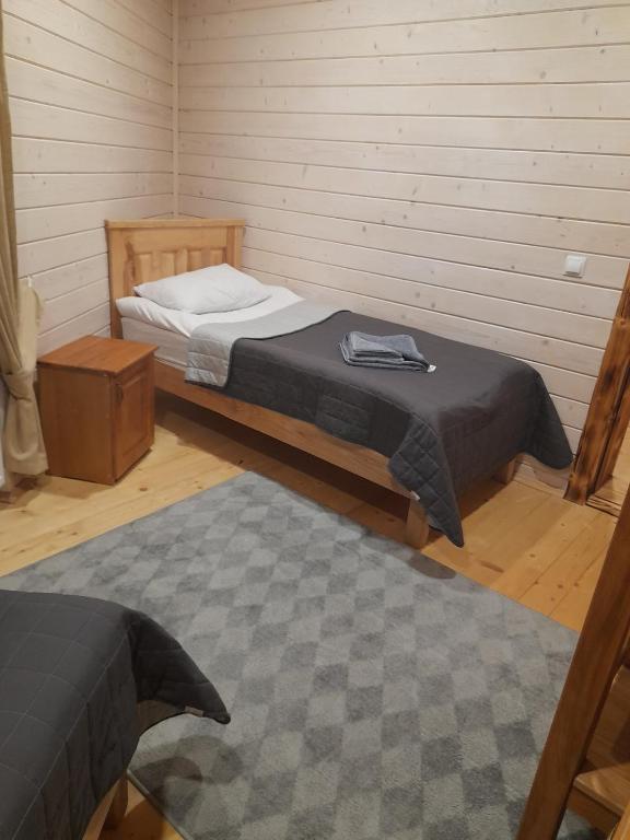 Postel nebo postele na pokoji v ubytování Berloga Pylypets
