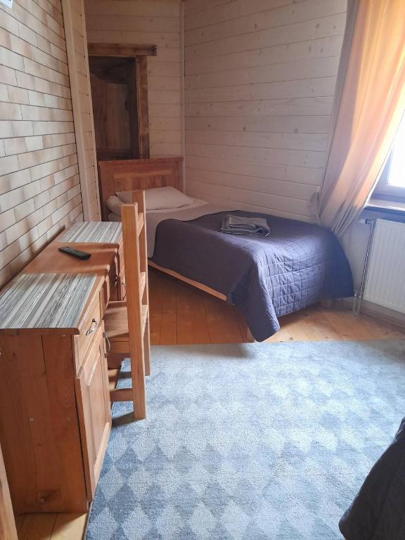 Postel nebo postele na pokoji v ubytování Berloga Pylypets