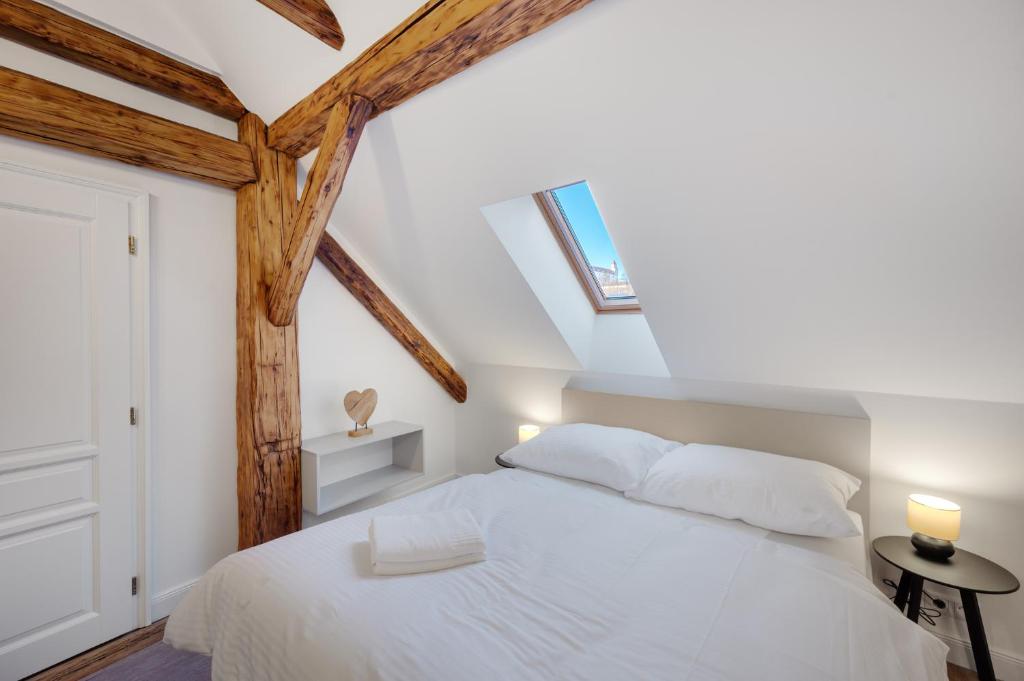 Posteľ alebo postele v izbe v ubytovaní Palace Apartments