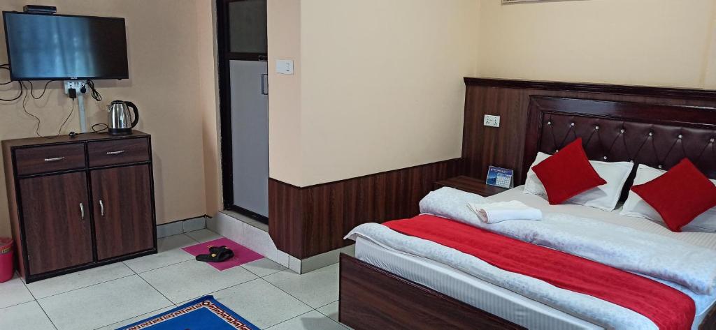 Postel nebo postele na pokoji v ubytování Hotel Royal Chautari, Butwal