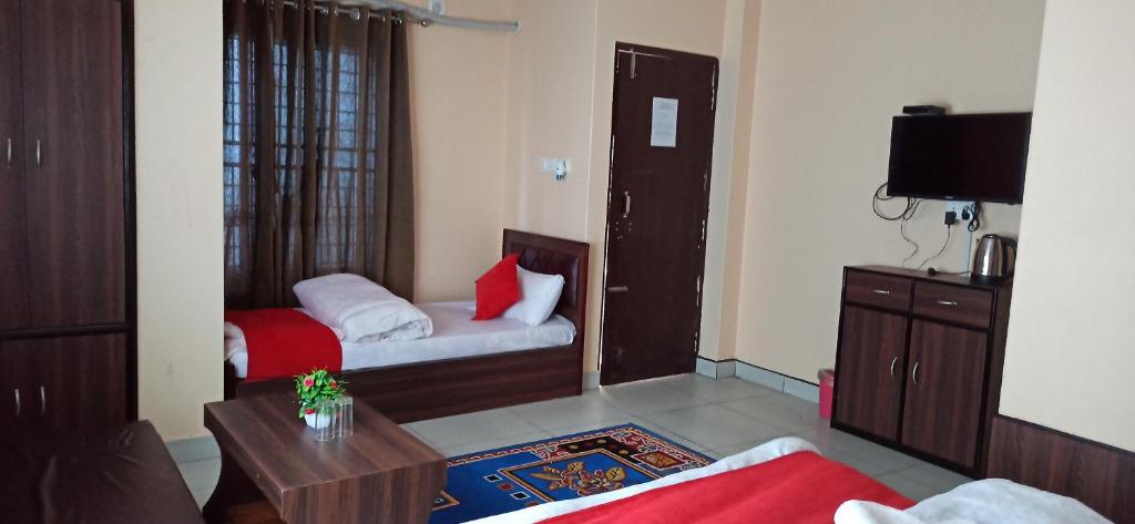 Postel nebo postele na pokoji v ubytování Hotel Royal Chautari, Butwal