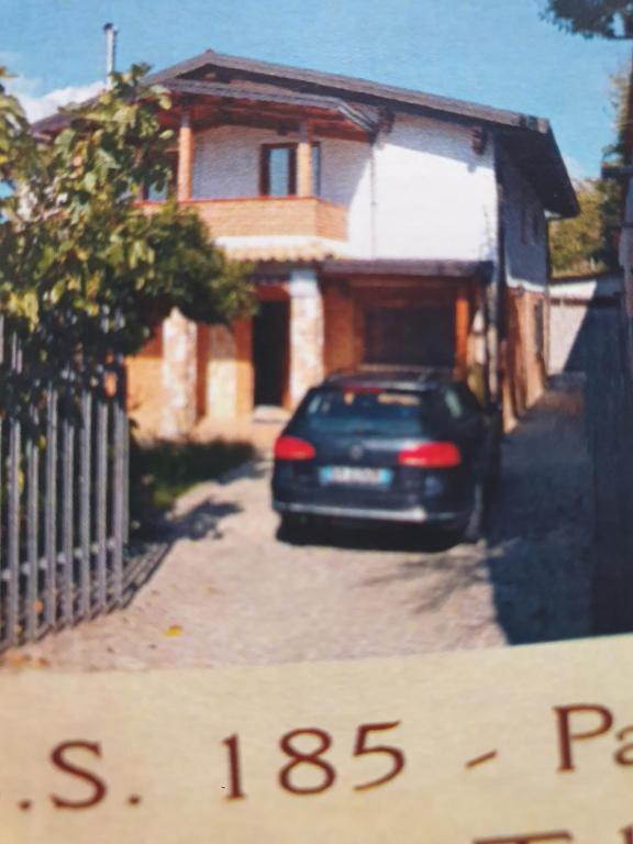 a car parked in front of a house at Chalet casa di ciccio in Motta Santa Lucia