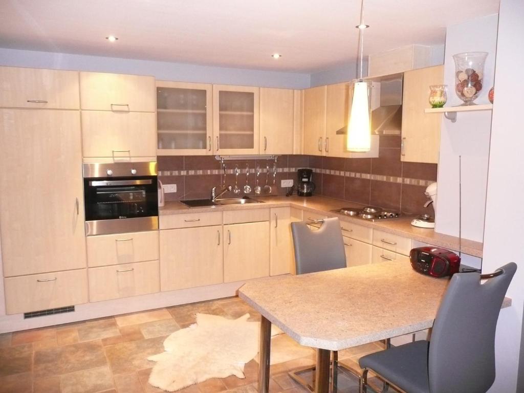 Kuchyň nebo kuchyňský kout v ubytování Ferienwohnung "Sweet Home"