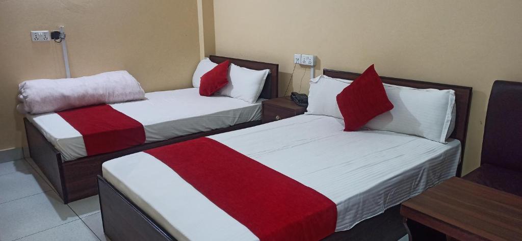 Postel nebo postele na pokoji v ubytování Hotel Royal Chautari, Butwal
