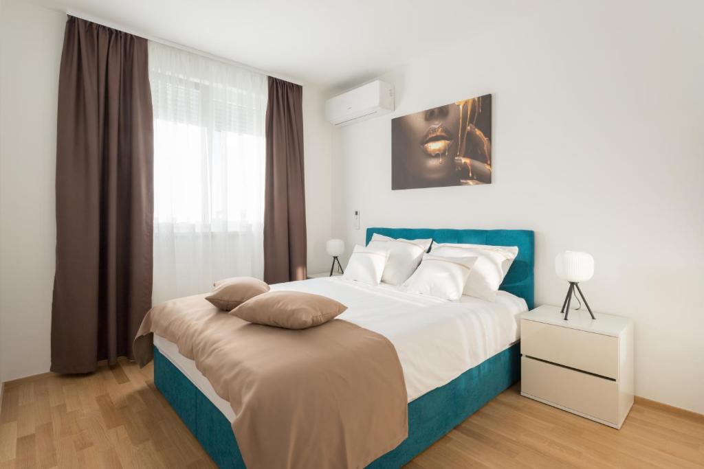Postel nebo postele na pokoji v ubytování Apartment Ruby