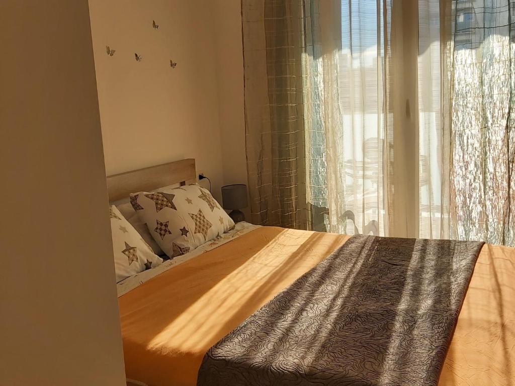 Postel nebo postele na pokoji v ubytování Apartman Miss T
