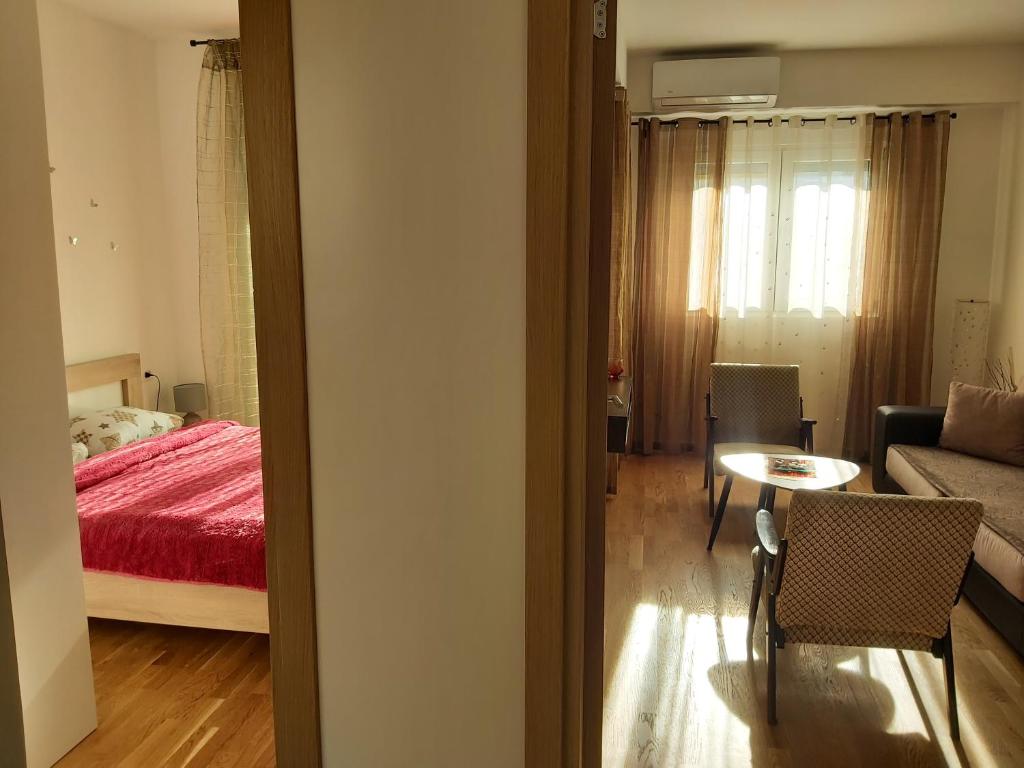 Postel nebo postele na pokoji v ubytování Apartman Miss T