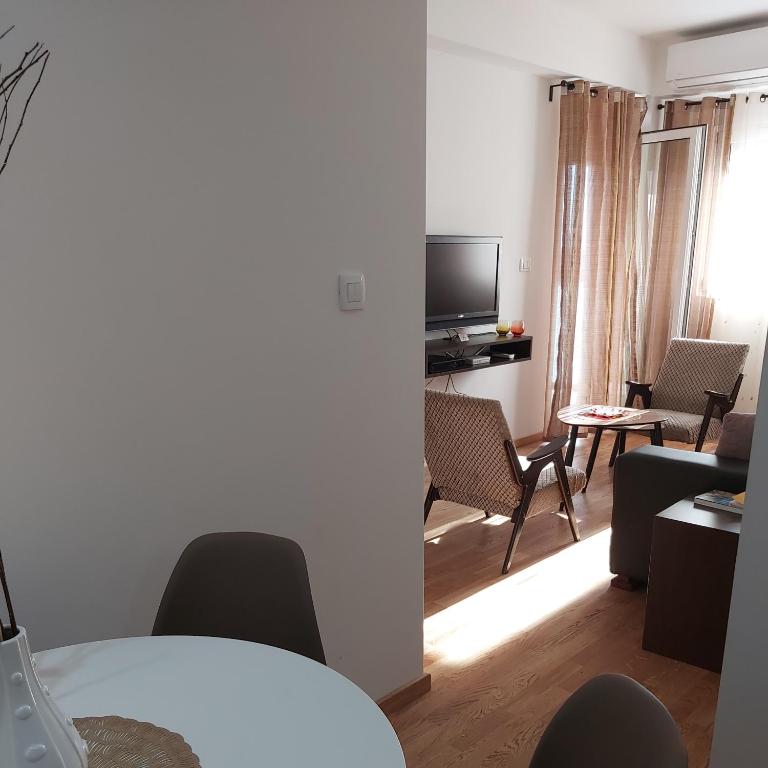TV a/nebo společenská místnost v ubytování Apartman Miss T