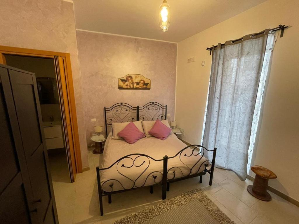 Postel nebo postele na pokoji v ubytování Il Borgo Antico B & B