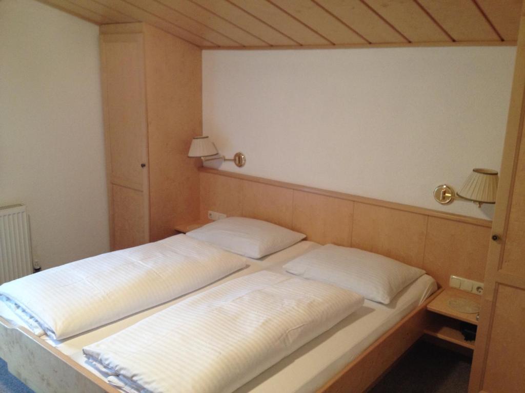 Postel nebo postele na pokoji v ubytování Apartpension Kappacher