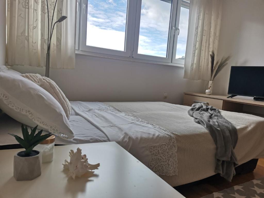Posteľ alebo postele v izbe v ubytovaní Charming studio with river view