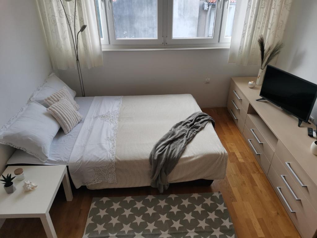 Posteľ alebo postele v izbe v ubytovaní Charming studio with river view