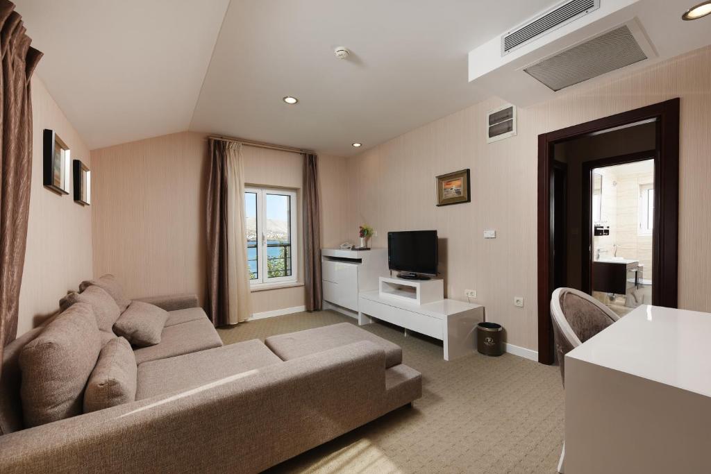 TV i/ili zabavni centar u objektu Family Hotel Zanè