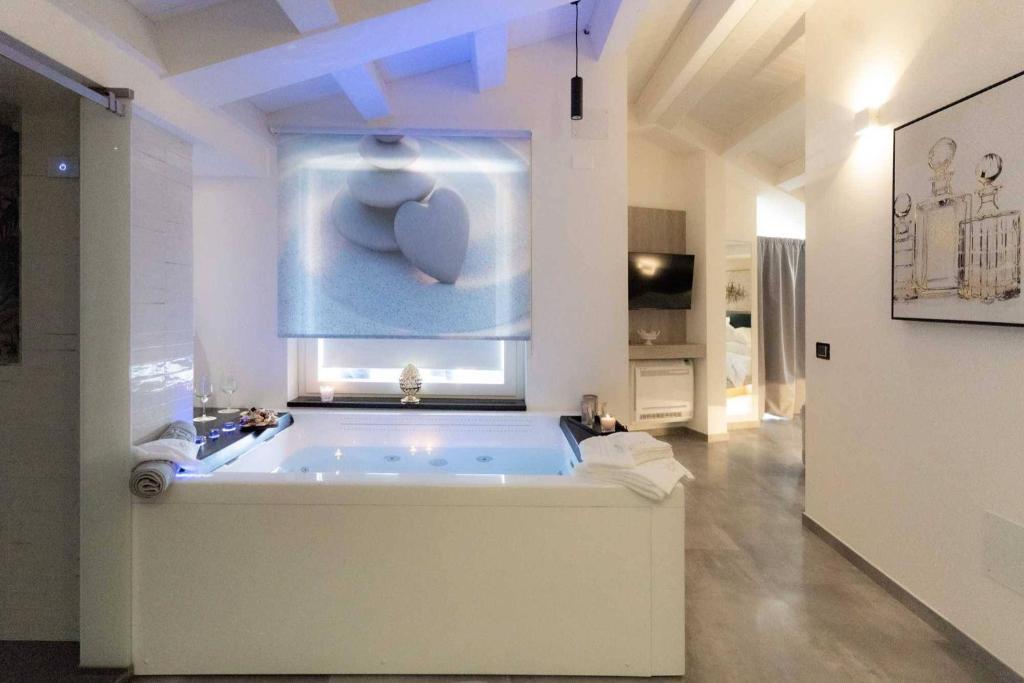 Postel nebo postele na pokoji v ubytování Carizza Rooms