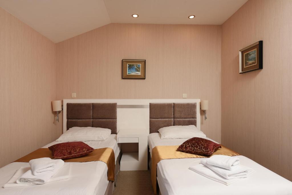 Krevet ili kreveti u jedinici u objektu Family Hotel Zanè